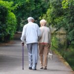 Old,Couple,Walking,In,The,Park